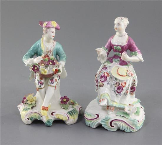 Two Derby Pale Family seated figures of a gentleman and a lady, c.1756-8, h. 13.3cm and 13.8cm, restorations